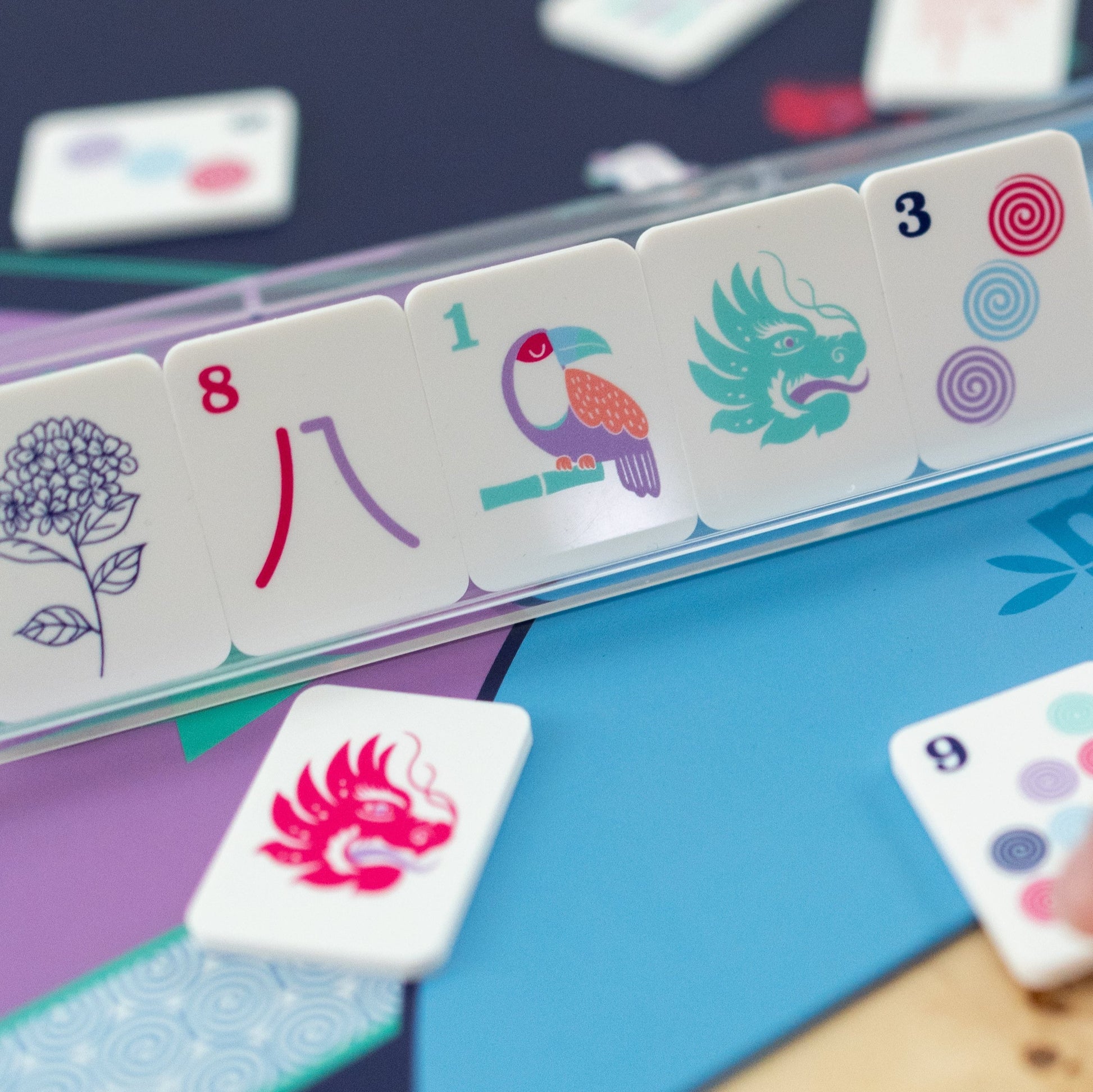 close up of an 8 crack, 1 bam bird, green dragon, and three dot