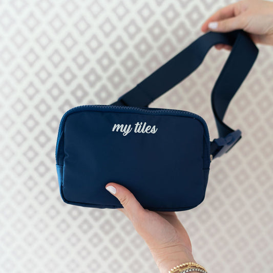 navy blue belt bag for carrying mahjong tiles with "my tiles" stitched onto it