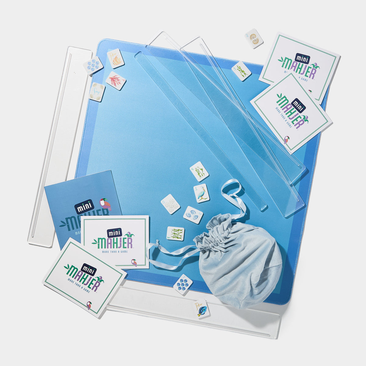 Mini Mahjer Beach Edition complete Mahjong game set with tiles, mat, travel racks, cards, and instructional guide