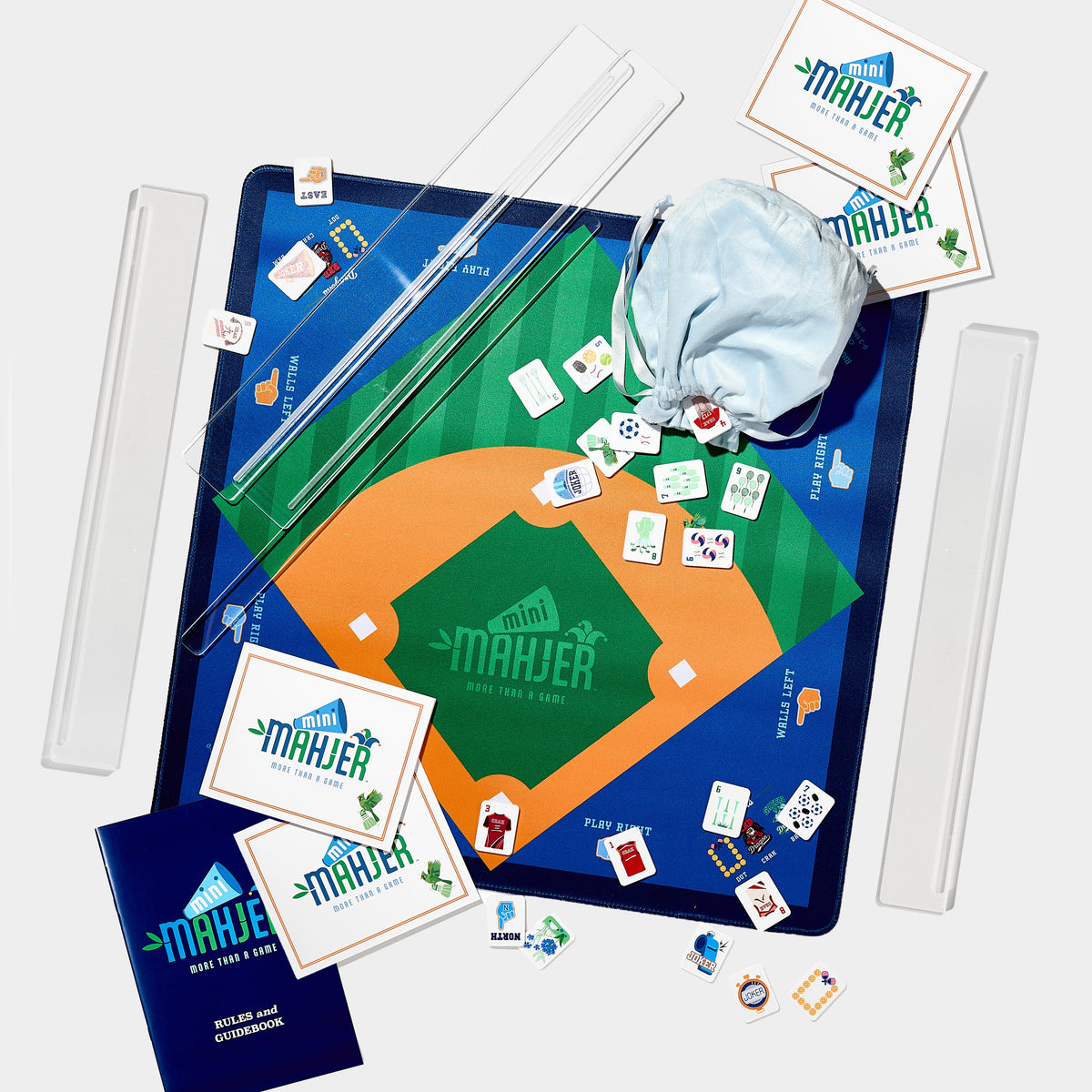 Mini Mahjer Rookie Edition complete Mahjong game set with tiles, mat, travel racks, cards, and instructional guide