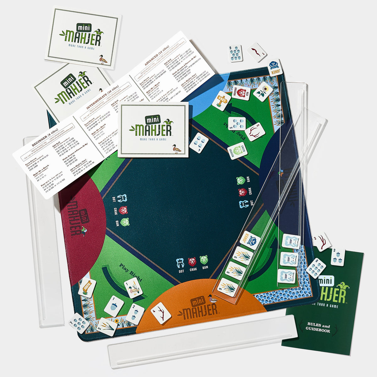 Mini Mahjer Woodlands Edition complete Mahjong game set with tiles, mat, travel racks, cards, and instructional guide
