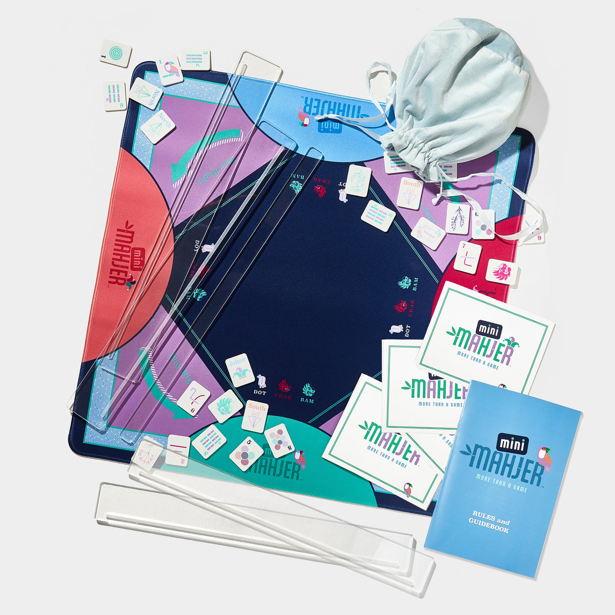 Mini Mahjer OG Edition complete Mahjong game set with tiles, mat, travel racks, cards, and instructional guide