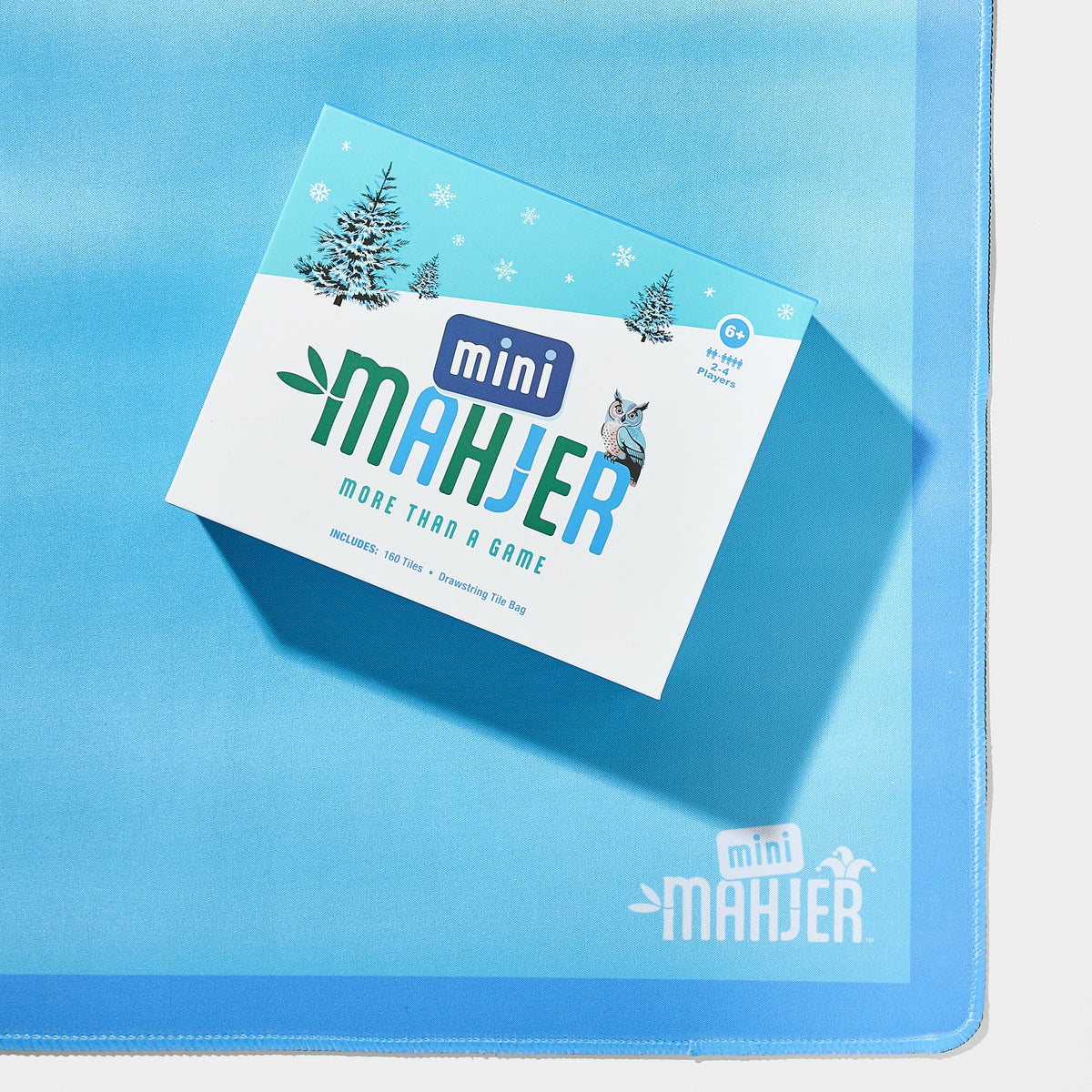 Mini Mahjer Ski Edition Mahjong Tiles and Blue Travel Mat